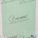 LH FRONT DOOR GLASS GREEN